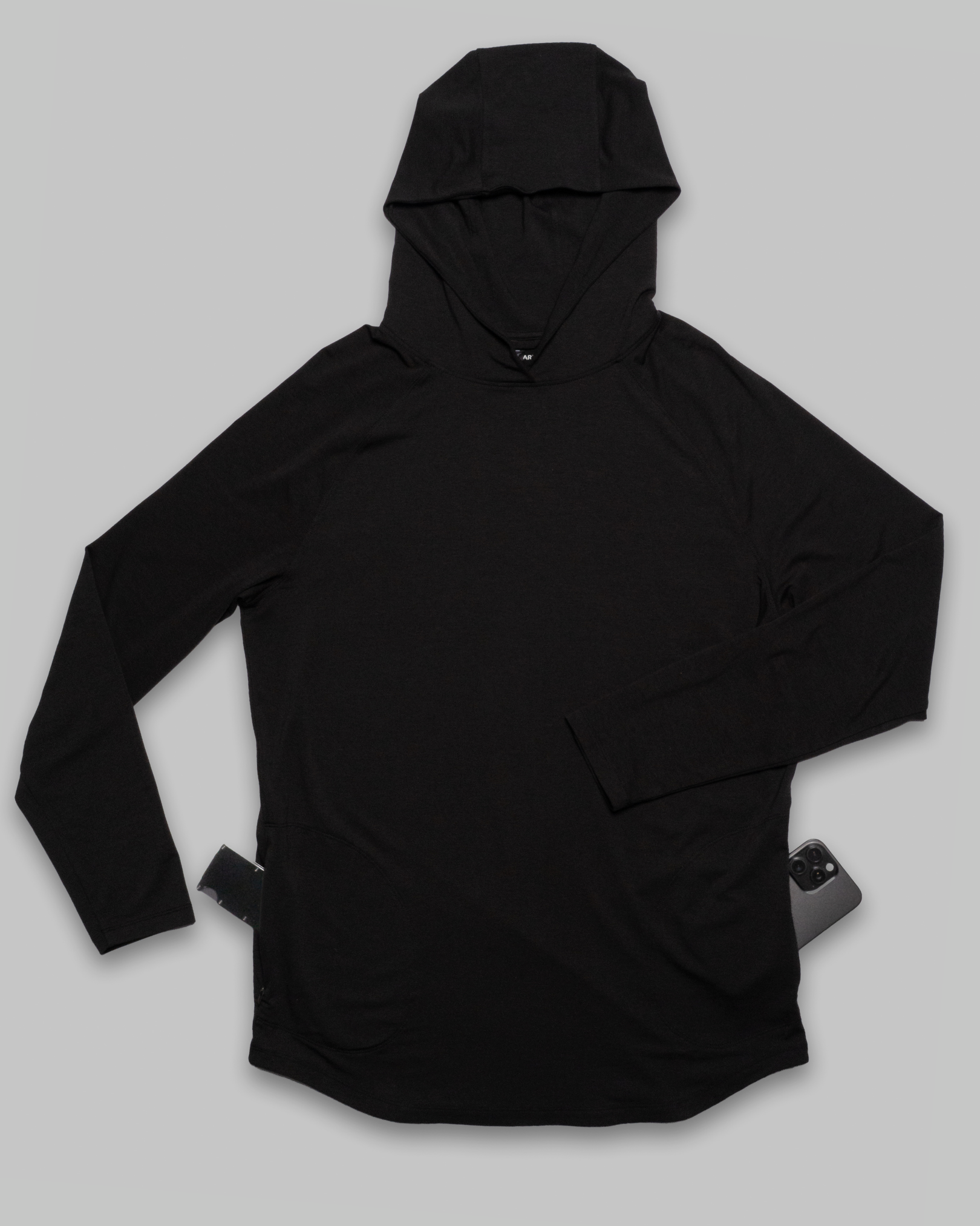 Black hoodie on a light gray background